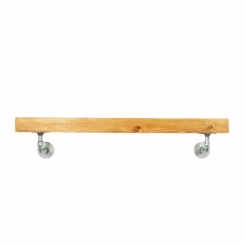 Industrial silver curved pipe shelf brackets holding shelf