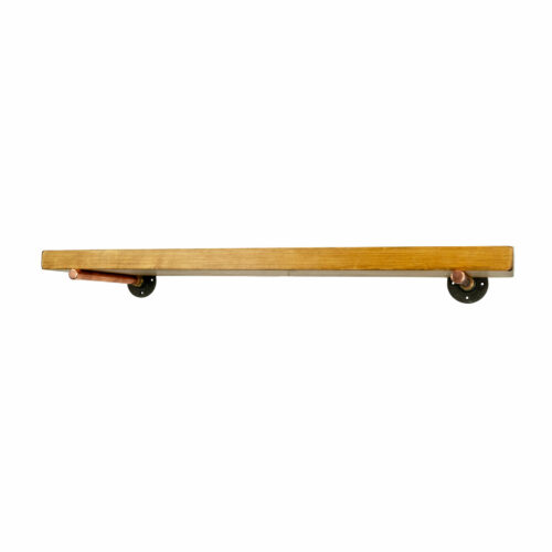 Copper floating shelf brackets holding shelf