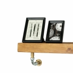 Elbow brackets brass and stainless steel close up pipedreamfurniture industrial shelving
