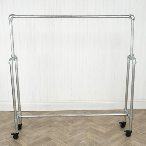 Industrial-silver-key-clamp-clothing-rail-with-wheels-1