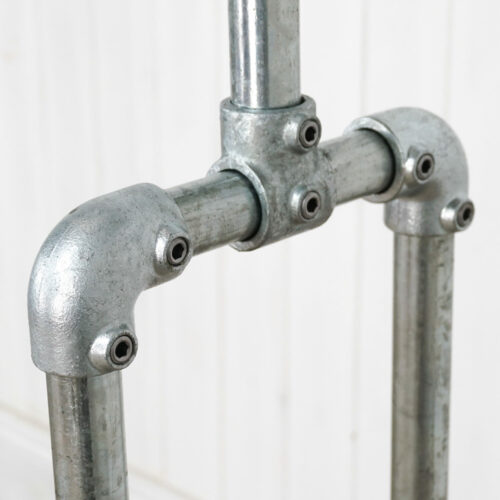 Industrial-silver-key-clamp-clothing-rail-with-wheels-2